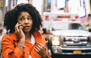 woman calling 911 in New york city. been in an accident